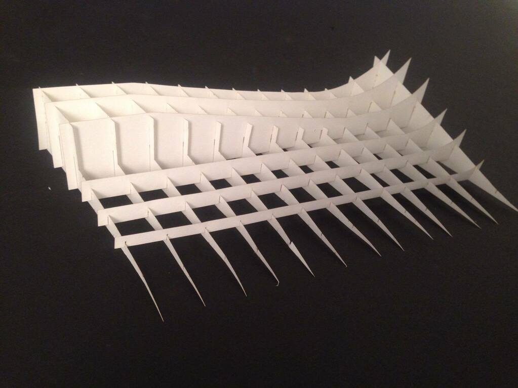 A laser cut paper model of the final ramp structure.